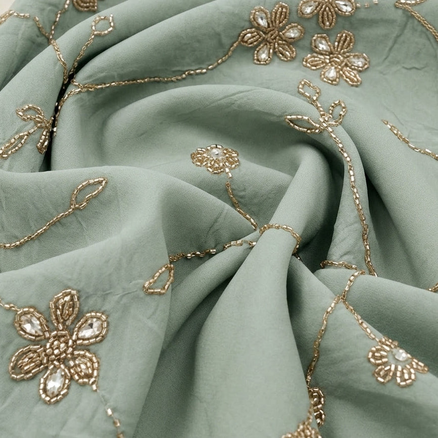 Light Blue Embroidery Organza Fabric, swirled to show the drape