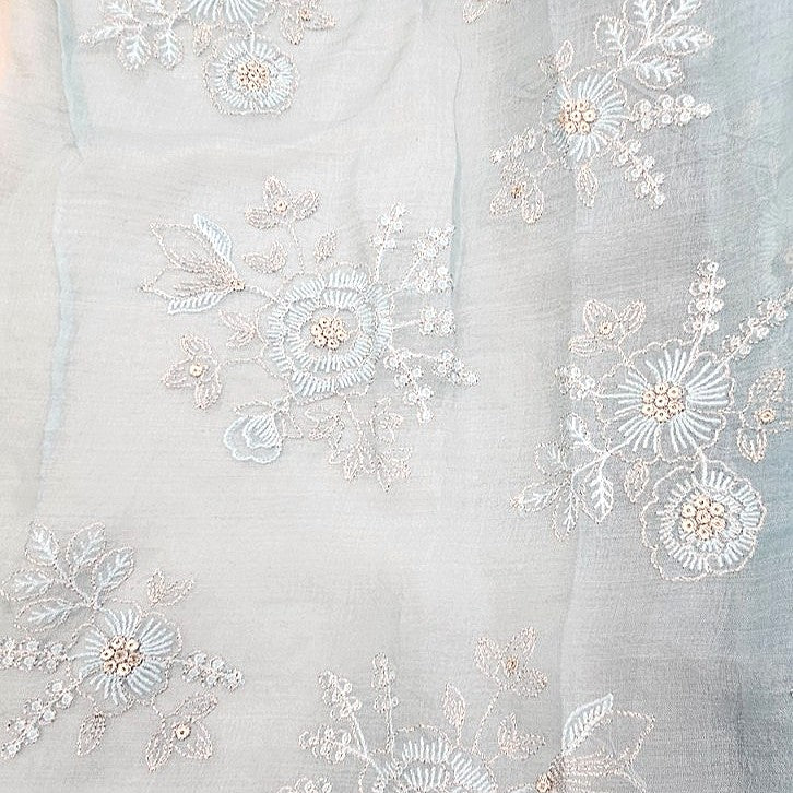 Light Blue Embroidery Tissue Fabric, laid flat