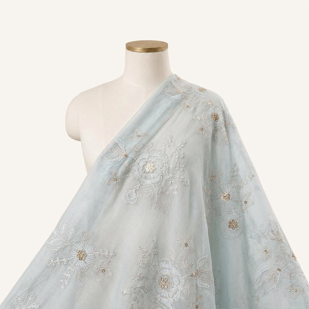 Light Blue Embroidery Tissue Fabric Draped as a saree