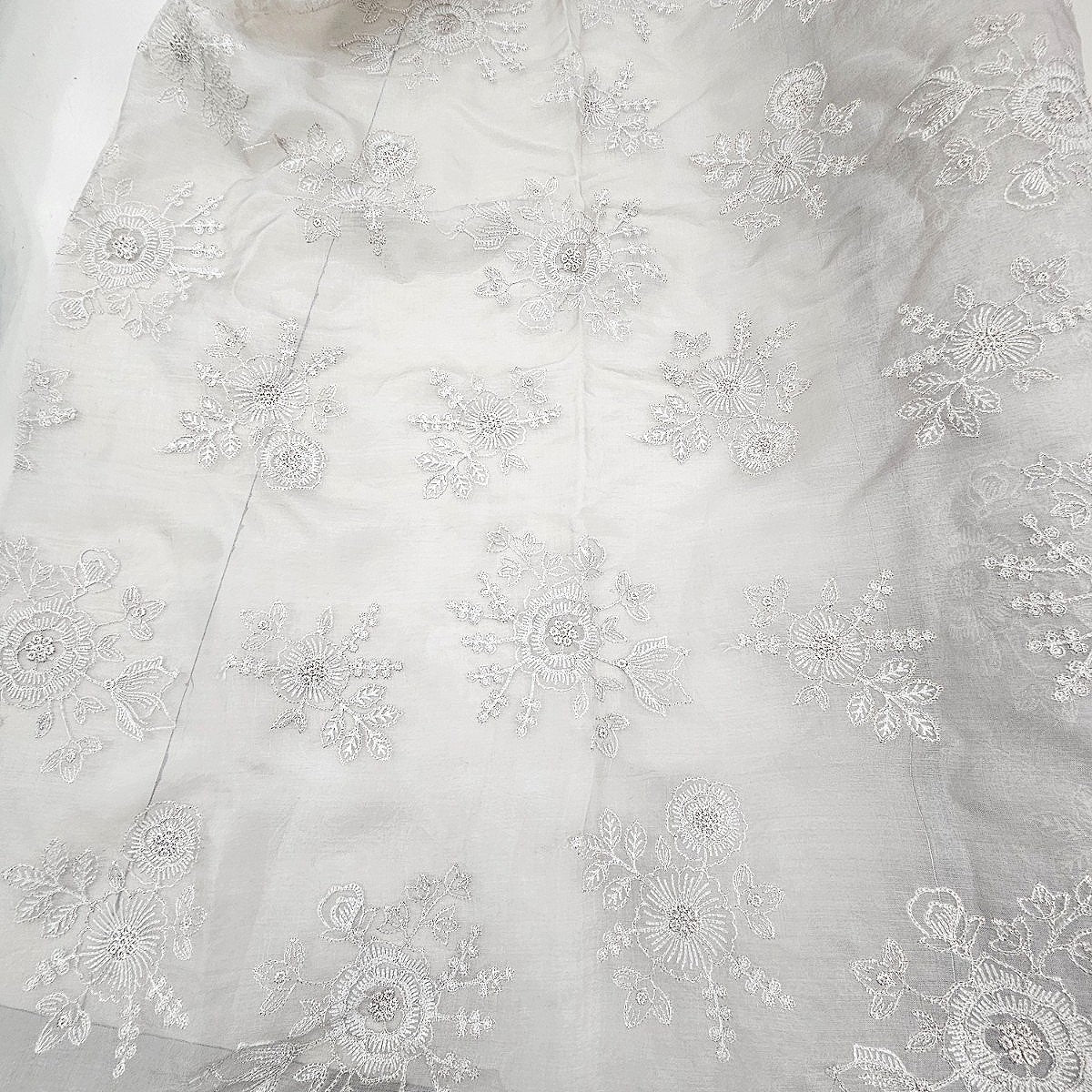 Grey Embroidery Tissue Fabric, laid flat