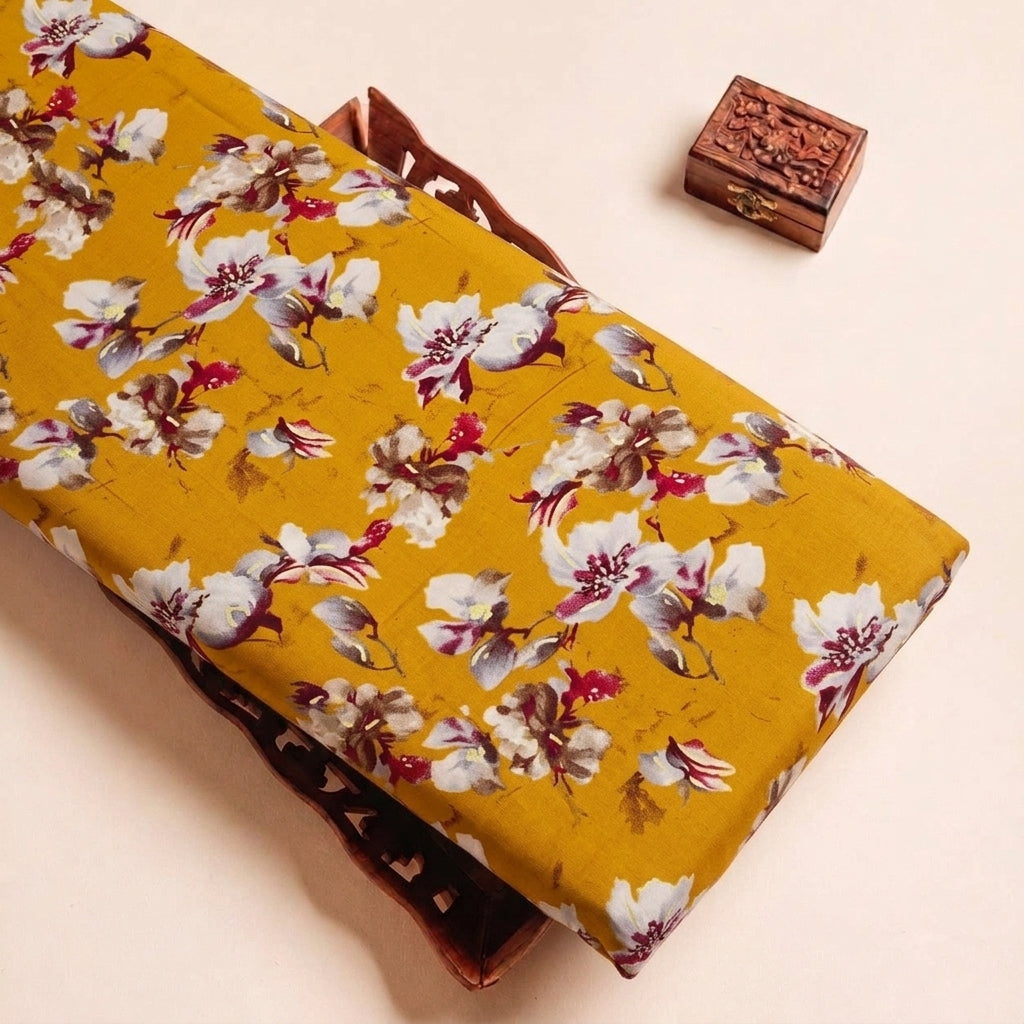 Folded Yellow Foil Print Rayon Fabric Highlighting Floral and Texture