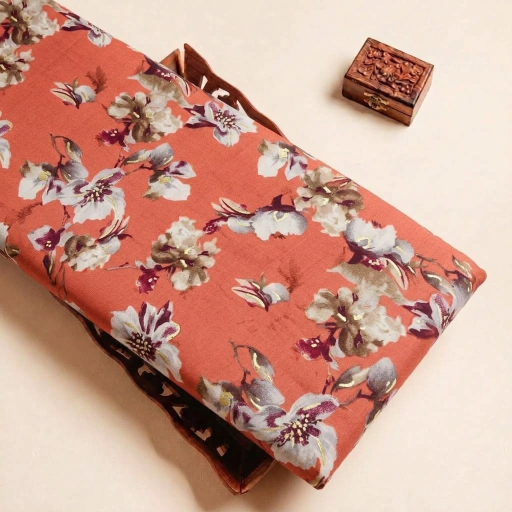 Folded Dark Peach Foil Print Rayon Fabric Highlighting Floral and Texture