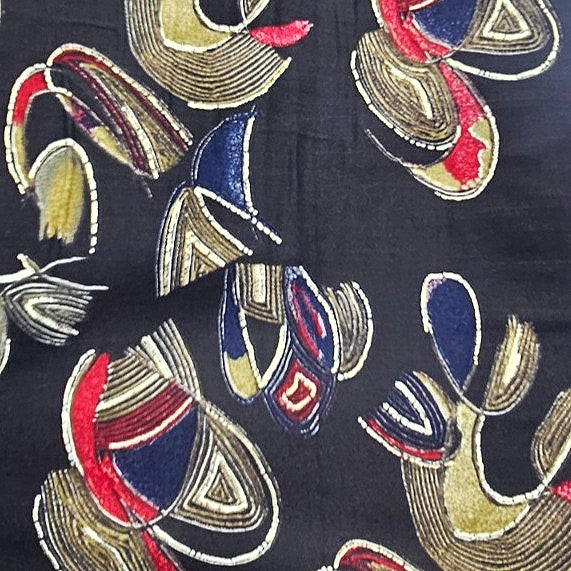 Black Foil Print Rayon Fabric, laid flat
