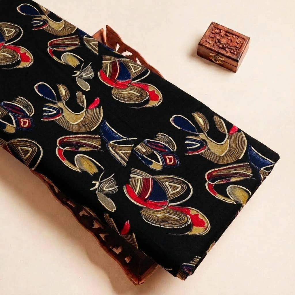 Folded Black Foil Print Rayon Fabric Highlighting Abstract and Texture
