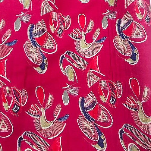 Pink Foil Print Rayon Fabric, laid flat