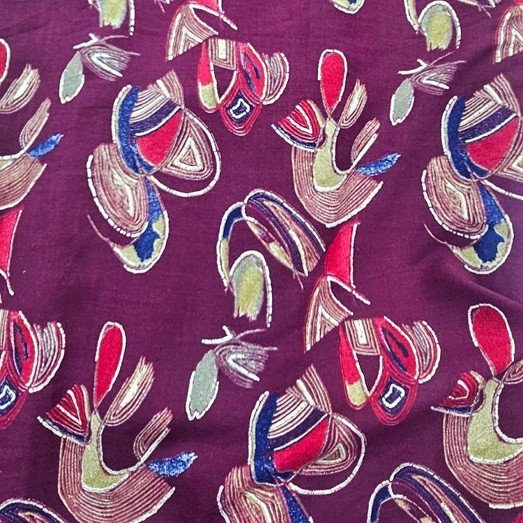 Purple Foil Print Rayon Fabric, laid flat