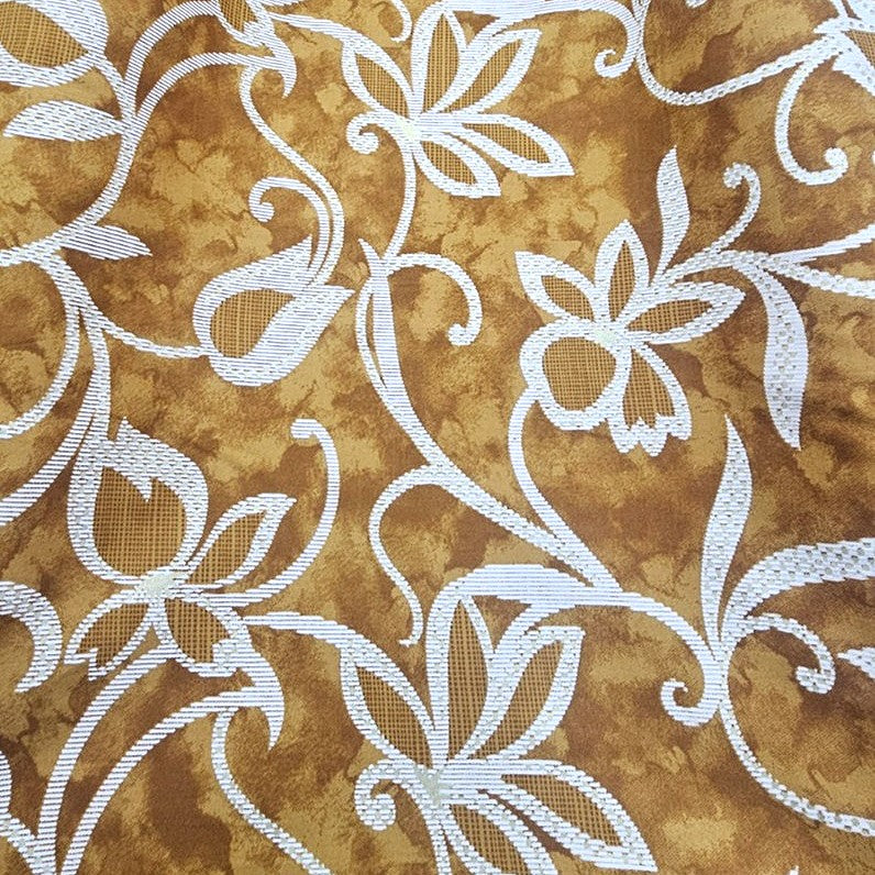 Yellow Foil Print Rayon Fabric, laid flat