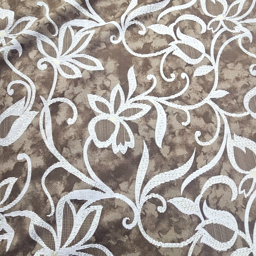 Brown Foil Print Rayon Fabric, laid flat