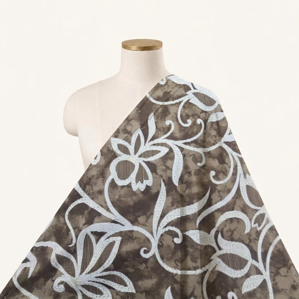 Brown Foil Print Rayon Fabric Draped as a saree
