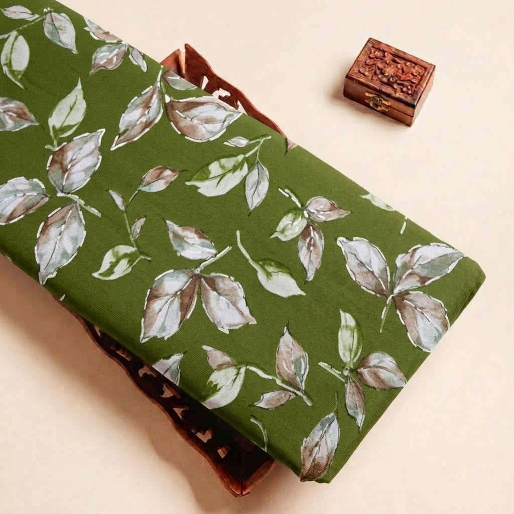 Folded Green Foil Print Rayon Fabric Highlighting Leaf and Texture