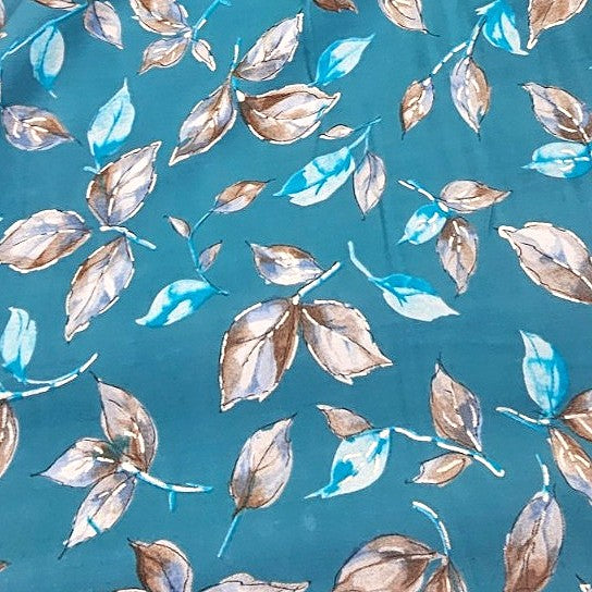 Blue Foil Print Rayon Fabric, laid flat