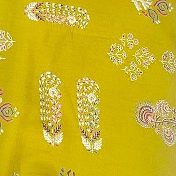 Yellow Foil Print Rayon Fabric, laid flat