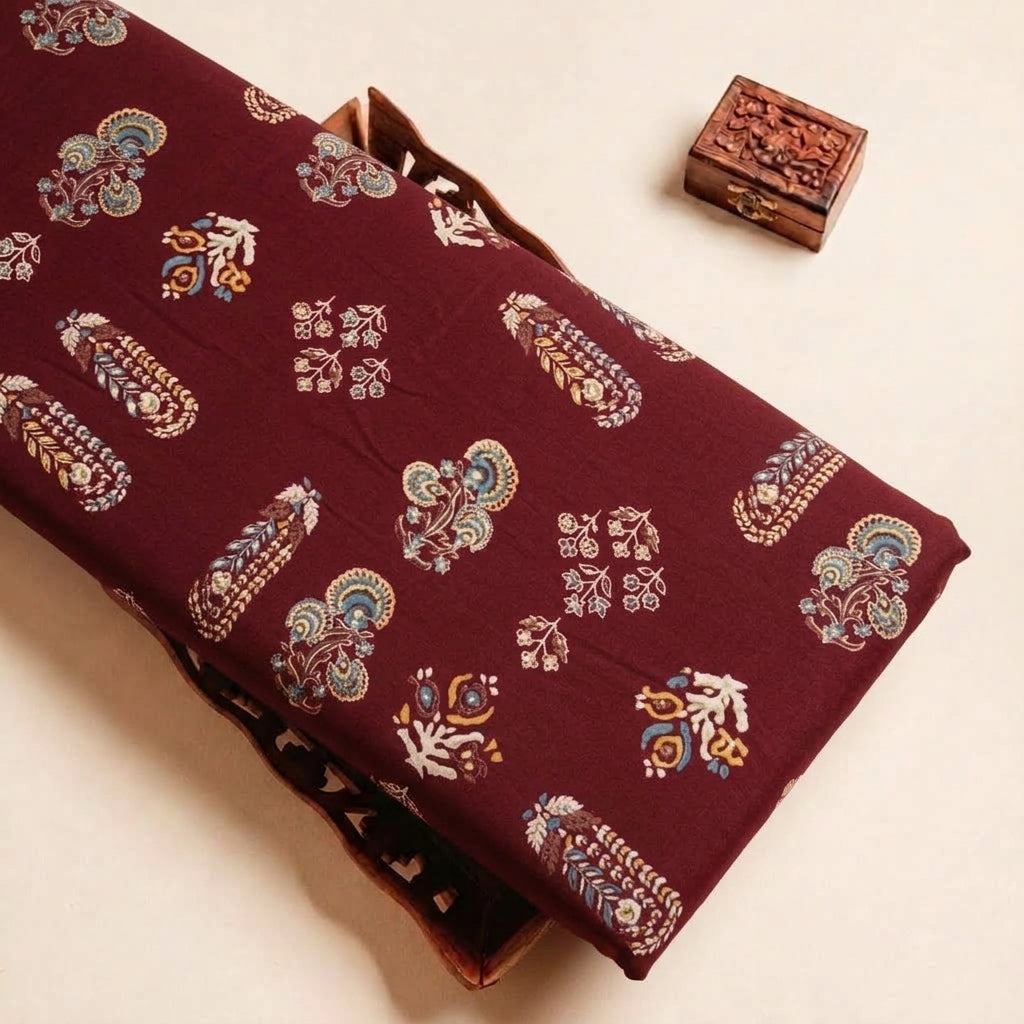 Maroon Foil Print Rayon Fabric, folded