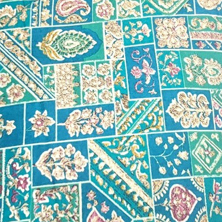 Green Paisley Rayon Fabric, laid flat