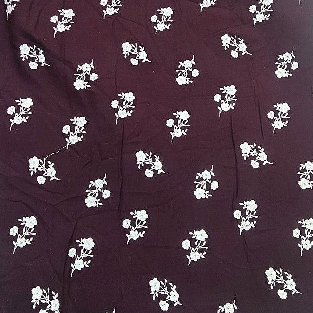 Wine Floral Rayon Fabric, laid flat