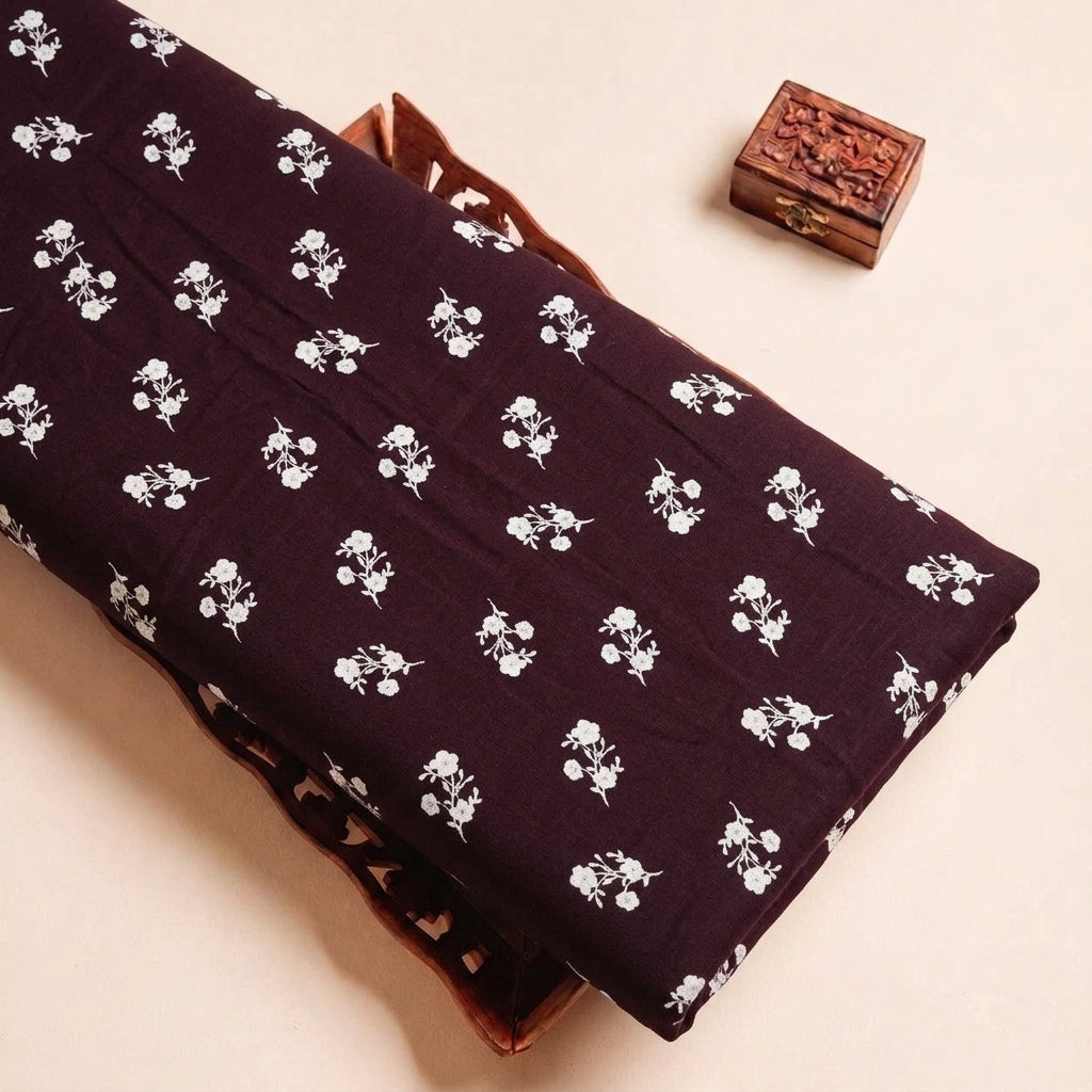 Folded Wine Floral Rayon Fabric Highlighting Texture
