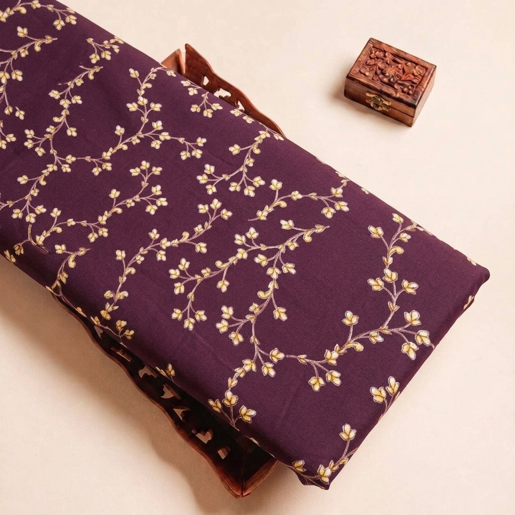 Folded Wine Floral Rayon Fabric Highlighting Foil and Texture
