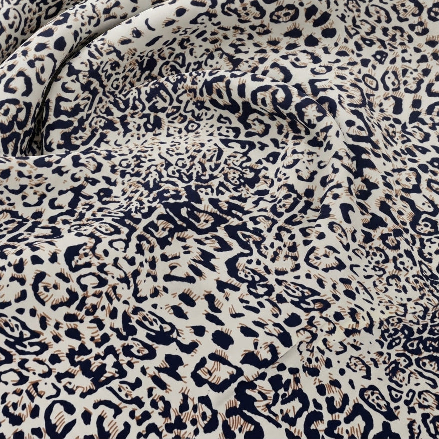 Swirled Brown Animal Print Rayon Fabric Showing Drape