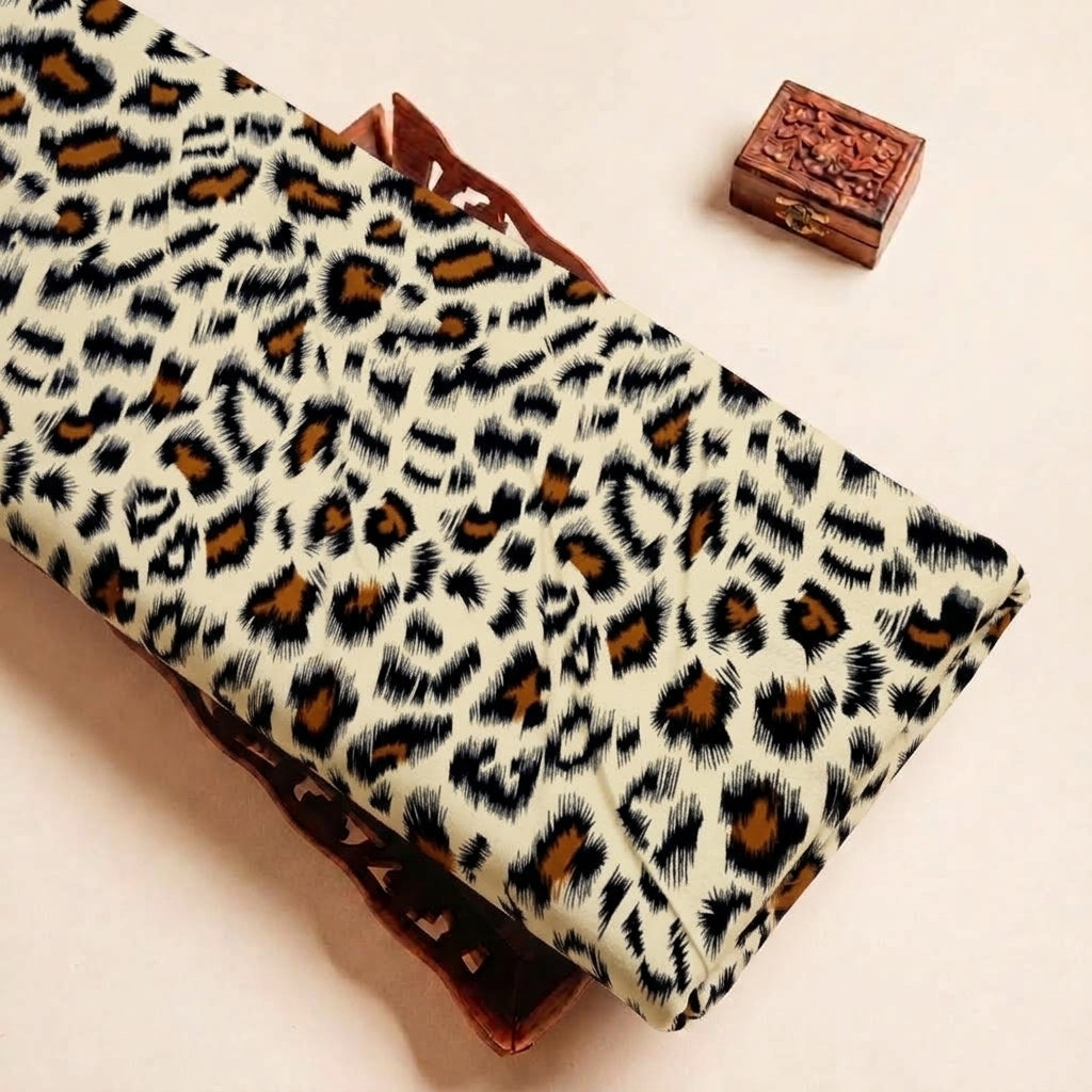 Folded Grey Animal Print Rayon Fabric Highlighting Texture