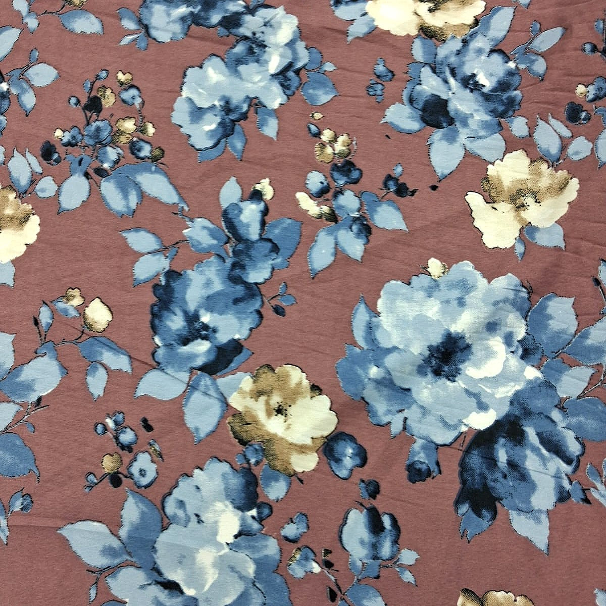 Brown Floral Crepe Fabric, laid flat