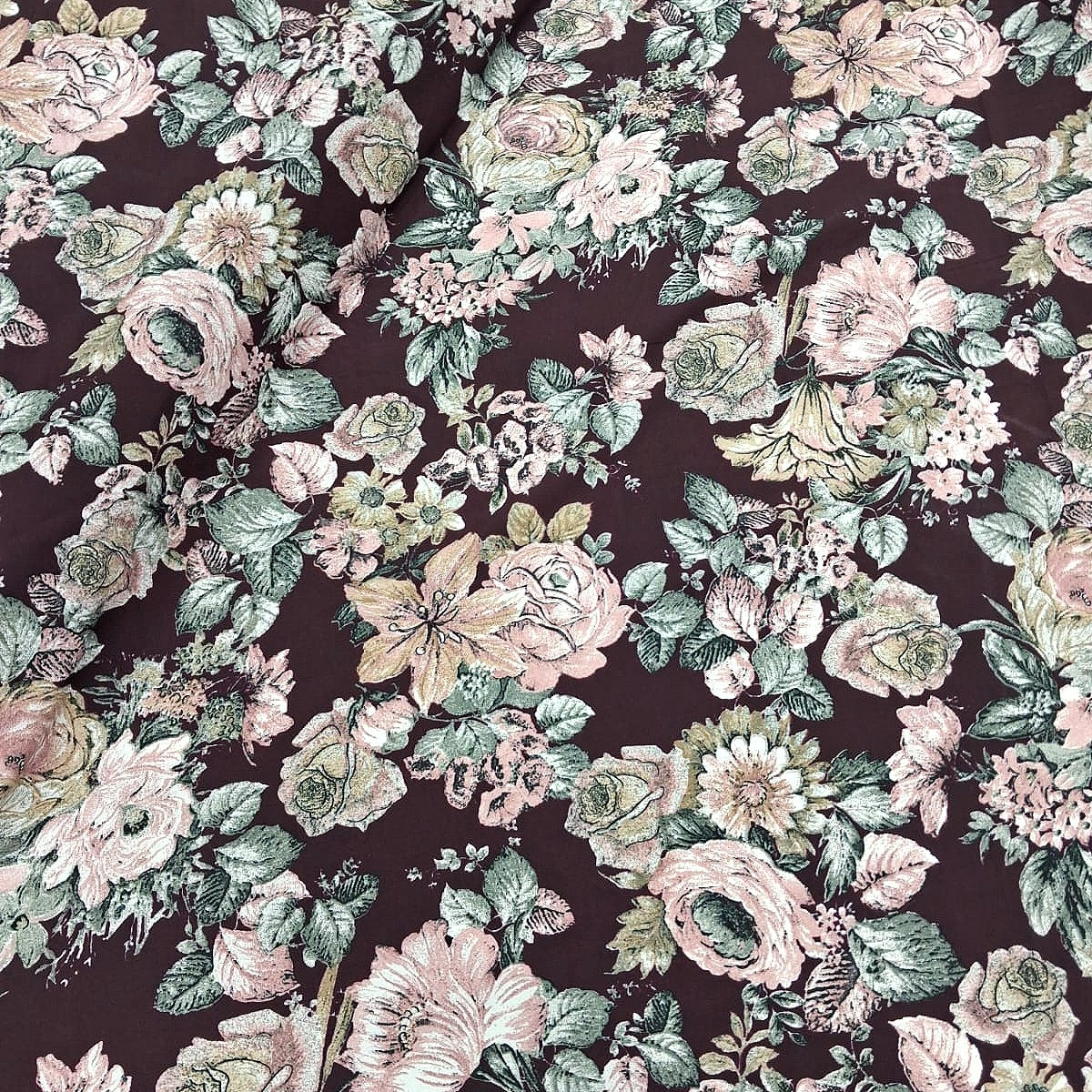 Wine Floral Crepe Fabric, laid flat