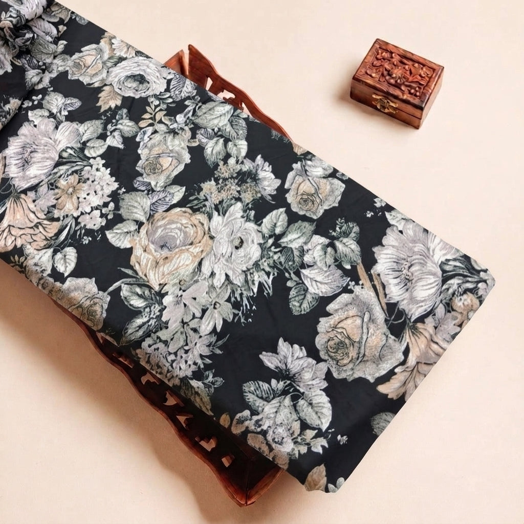 Folded Black Floral Crepe Fabric Highlighting Texture