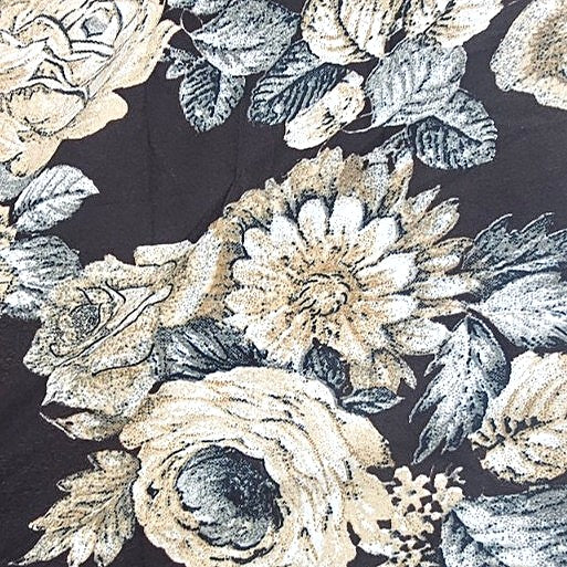 Brown Floral Crepe Fabric, laid flat