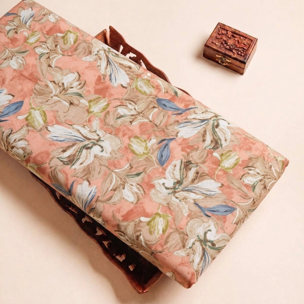 Folded Peach Floral Crepe Fabric Highlighting Texture