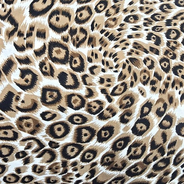 Cream Animal Print Crepe Fabric, laid flat