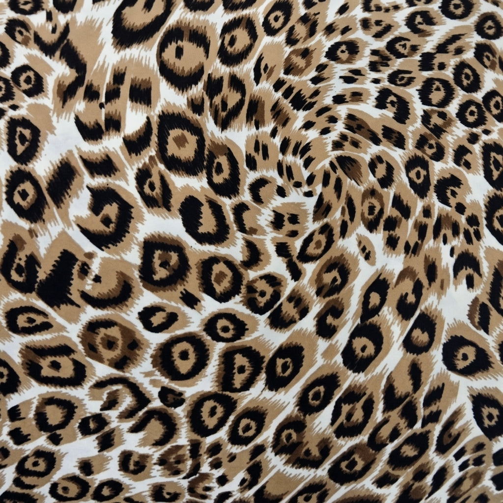 Cream Animal Print Crepe Fabric, swirled to show the drape