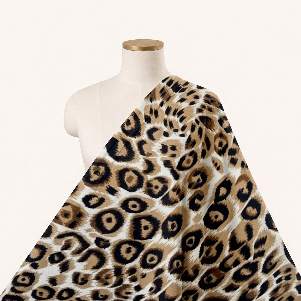Cream Animal Print Crepe Fabric, draped as a saree