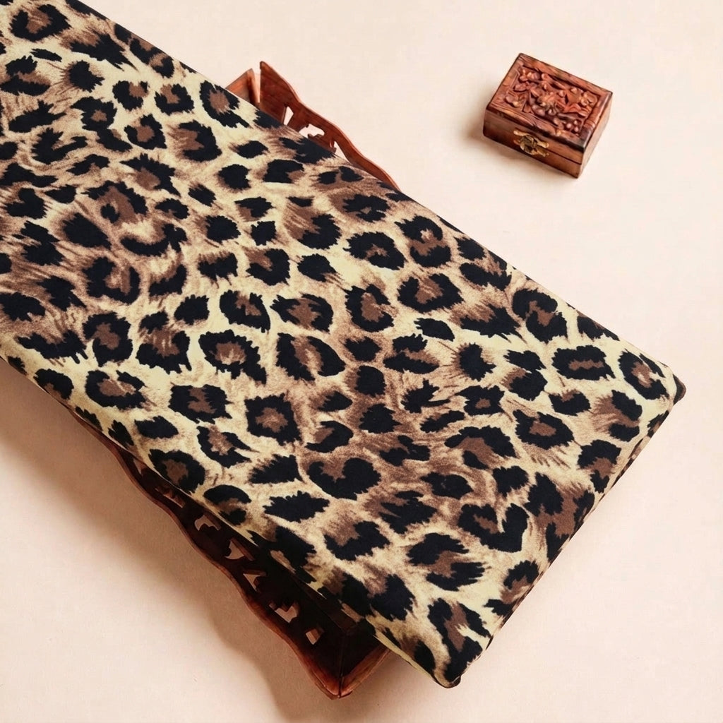 Folded Brown Animal Print Crepe Fabric Highlighting Texture