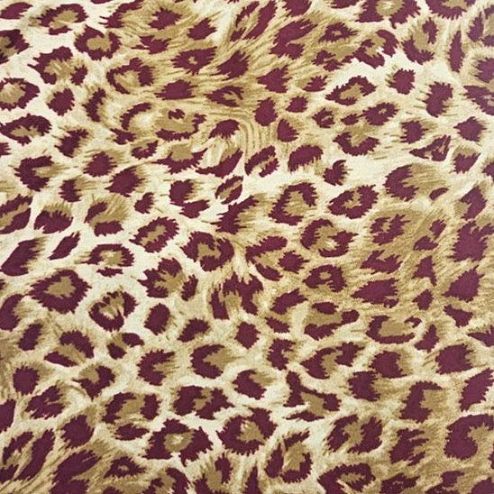 Pink Animal Print Crepe Fabric, laid flat
