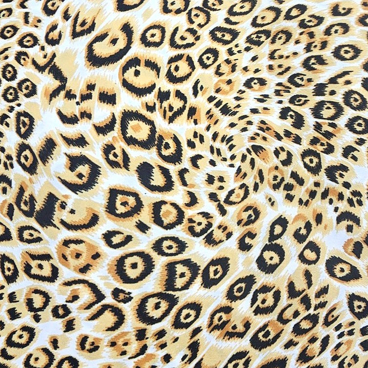 White Animal Print Crepe Fabric, laid flat