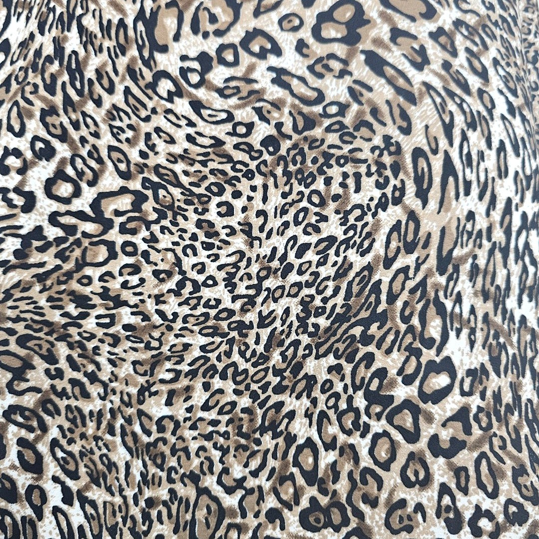 Grey Animal Print Crepe Fabric, laid flat
