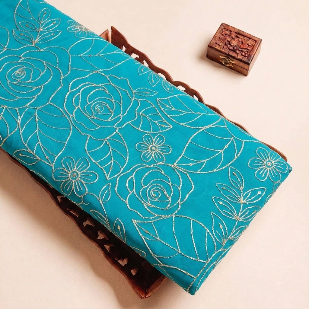 Blue Floral Embroidery Georgette Fabric, folded