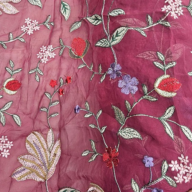 Pink Floral Embroidery Georgette Fabric, laid flat