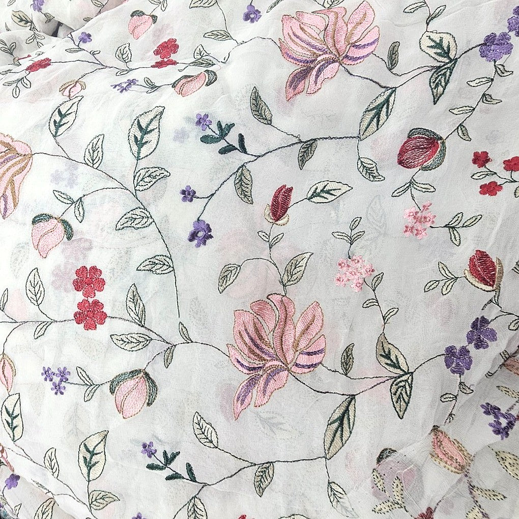 White Floral Embroidery Georgette Fabric, laid flat
