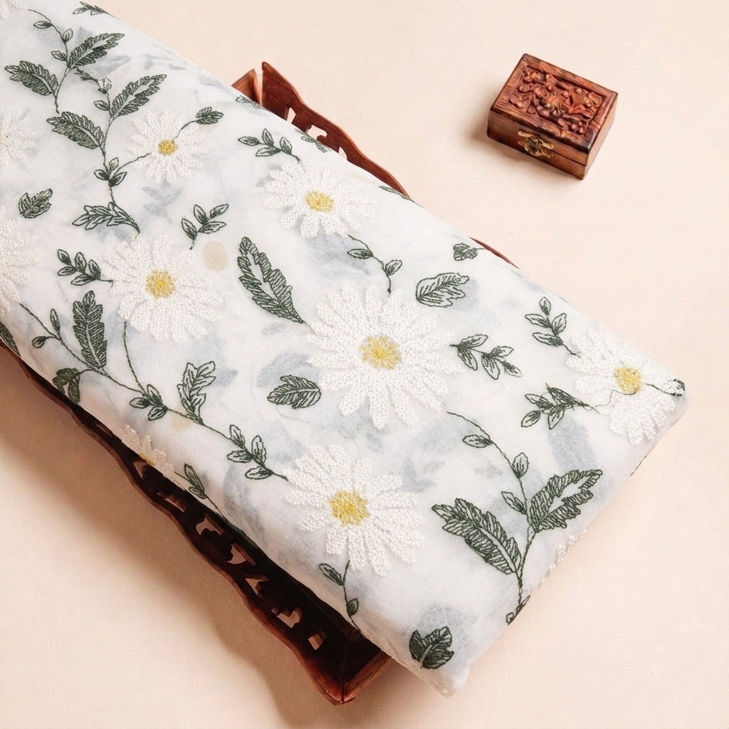 White Floral Embroidery Georgette Fabric, folded