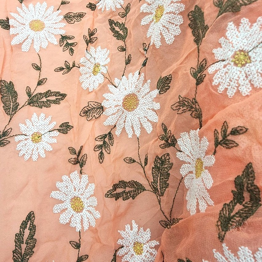 Peach Floral Embroidery Georgette Fabric, laid flat