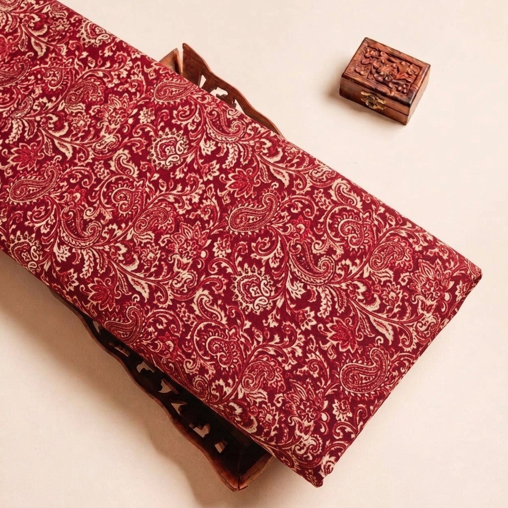 Maroon Paisley Crepe Fabric, folded