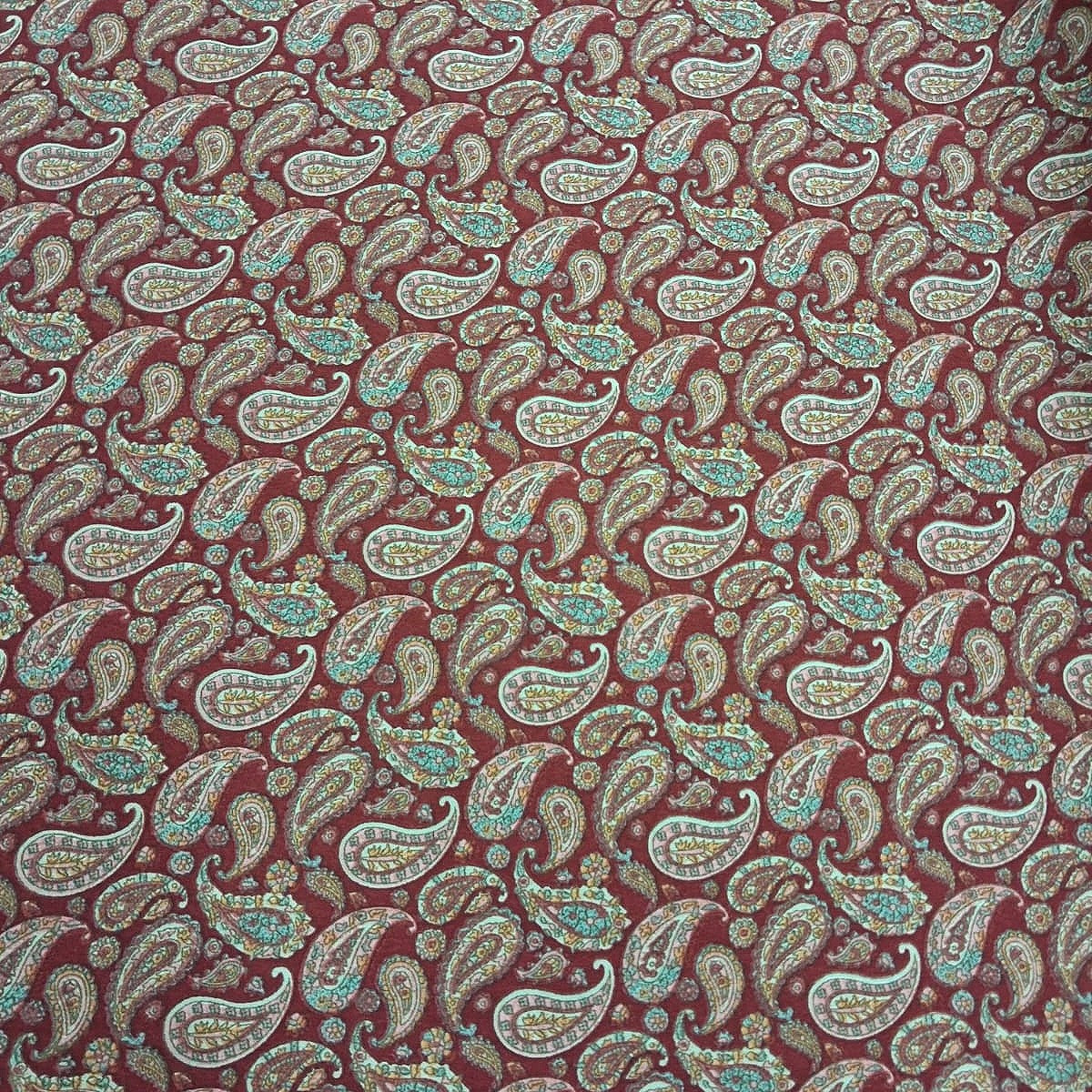 Pink Paisley Crepe Fabric, laid flat