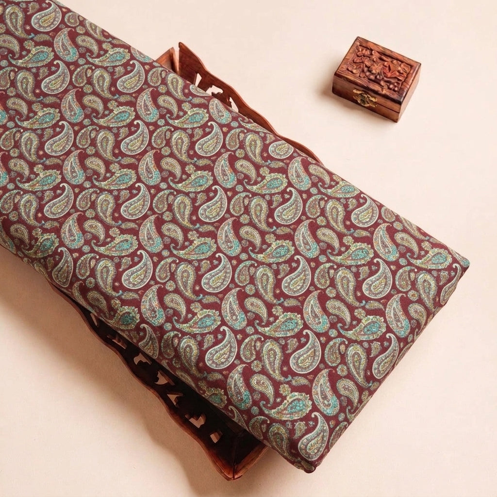 Folded Pink Paisley Crepe Fabric Highlighting Texture
