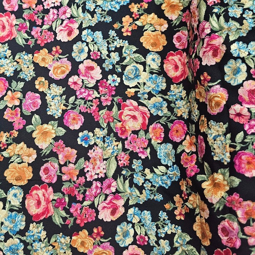 Black Floral Crepe Fabric, laid flat