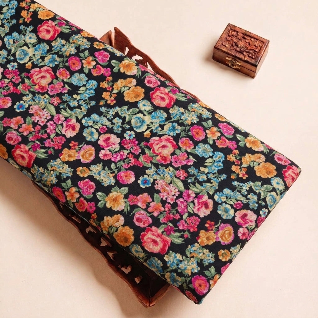 Folded Black Floral Crepe Fabric Highlighting Texture