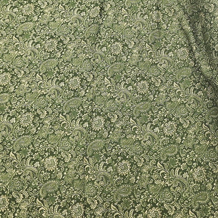 Green Paisley Crepe Fabric, laid flat