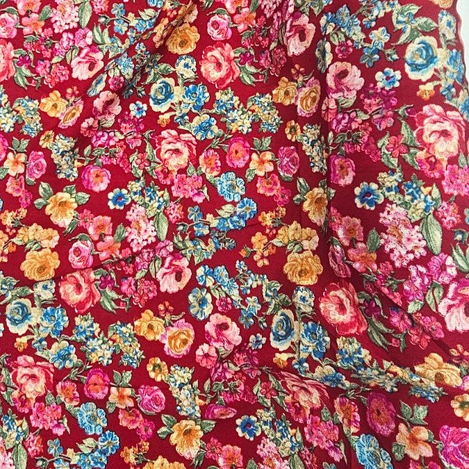 Pink Floral Crepe Fabric, laid flat
