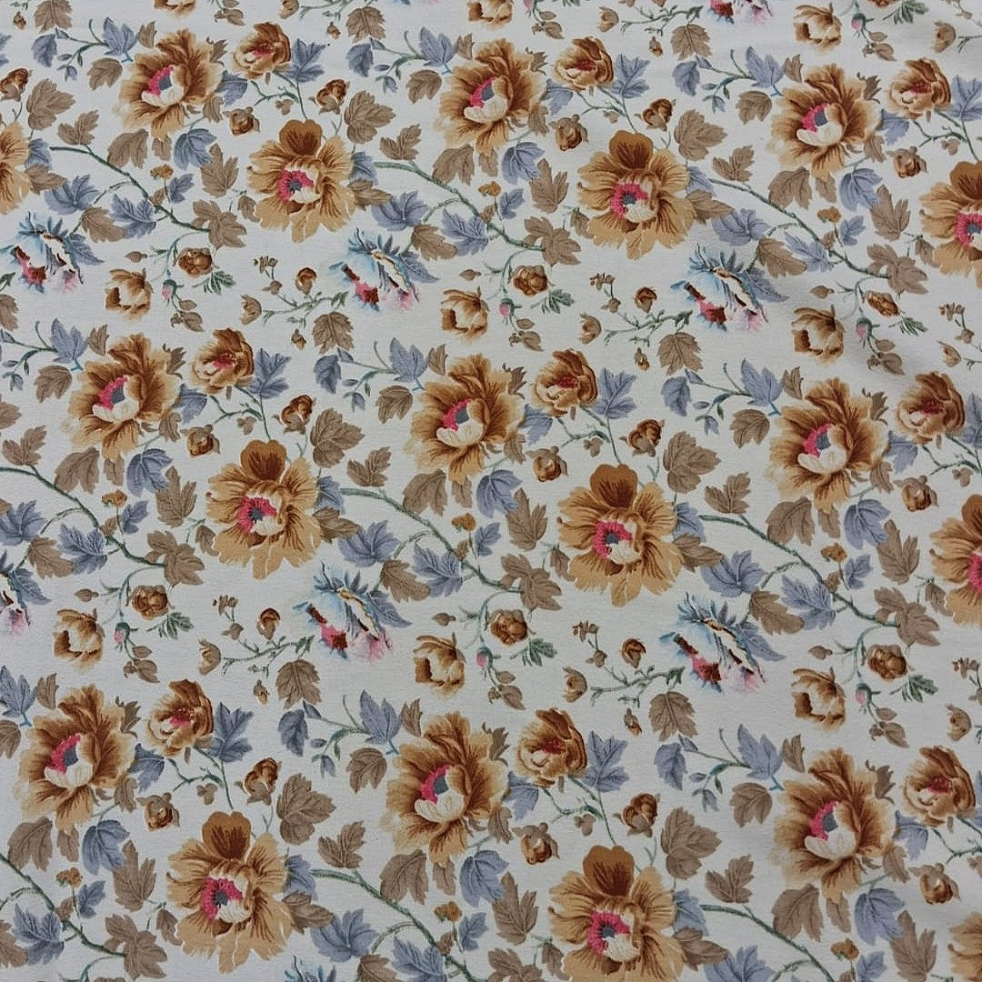 Cream Floral Crepe Fabric, laid flat