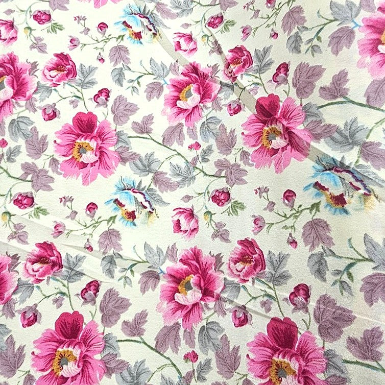 Pink Floral Crepe Fabric, laid flat