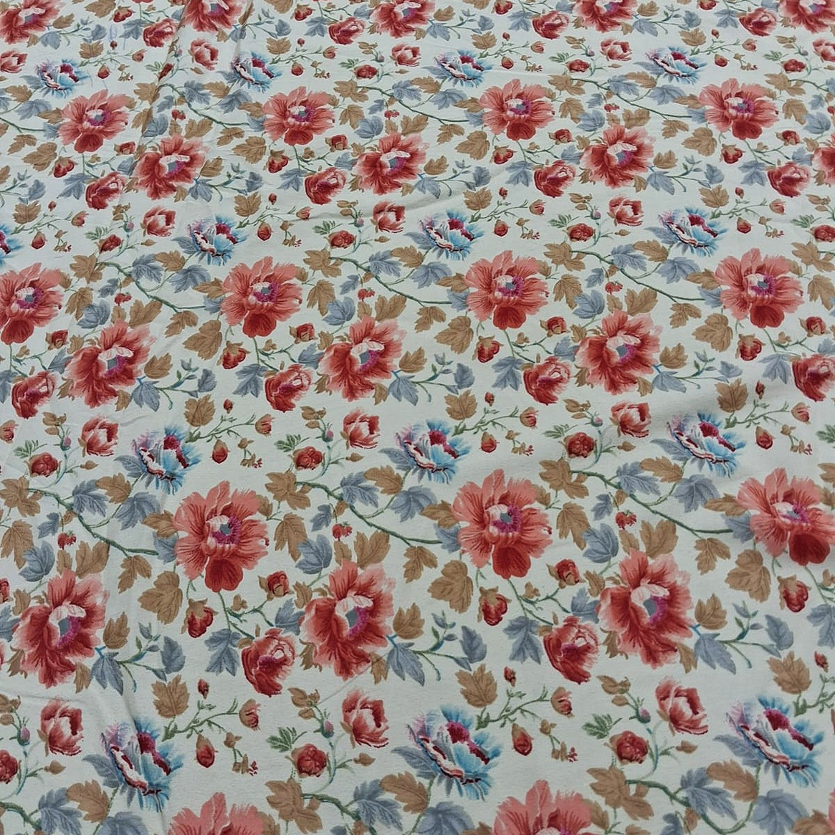 Cream Floral Crepe Fabric, laid flat